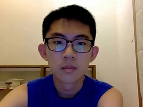 Hot Korean twink with a big dick in action.