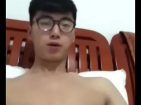 Asian boy gets a facial in this video.