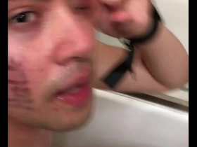 Gay toilet drowning scene with body worship