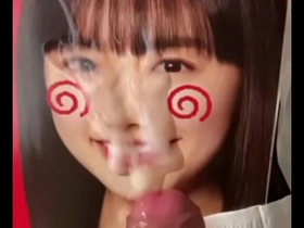Asuna Akita gets a facial with cum from several men in a hot scene.