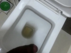 Hot Indian gay masturbates in the office bathroom