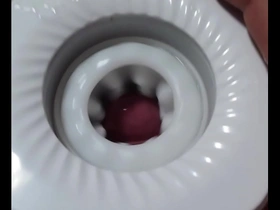 Japanese gay masturbates with a toy and gets an orgasm.