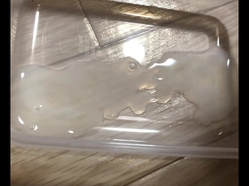 Japanese gay masturbates and cums in a jug