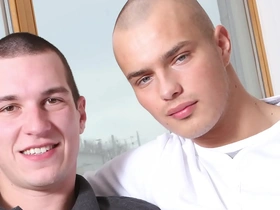 Shaved head gay hunk gets it hard in free porn video