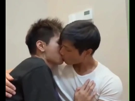Young Asian man masturbates and ejaculates while smoking.