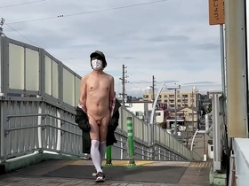 Sissy Ma Yuchan strips and pleases herself on a bridge in a public place