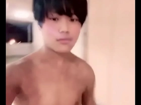 A cute Japanese boy who likes anal sex walks naked in public