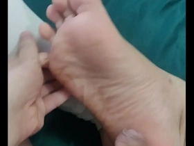 An Asian twink’s feet fetish: a sensual experience with a slippery cock