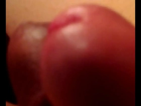 Two gay men pleasuring each other by rubbing their genitals.